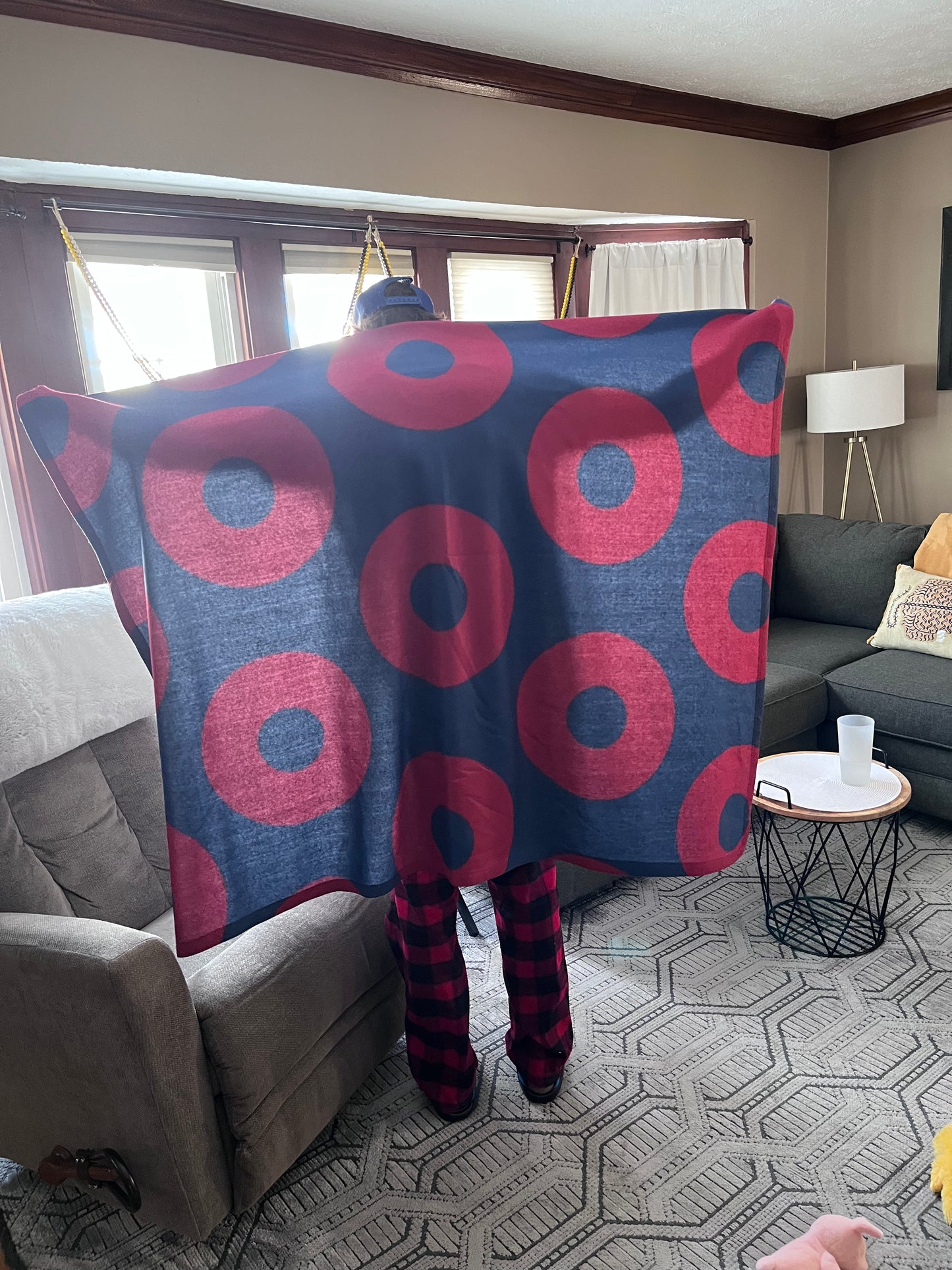 Person wearing a phish blanket